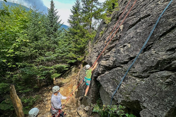 family rock climbing with IMCS