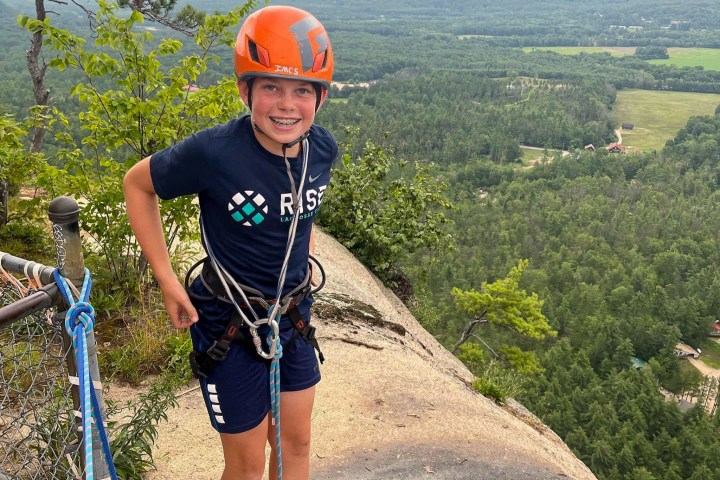 family rock climbing with IMCS