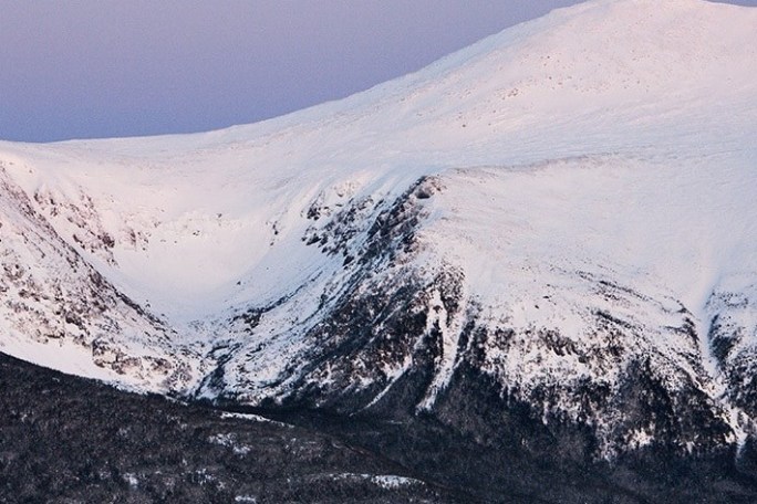 a view of a snow covered mountain