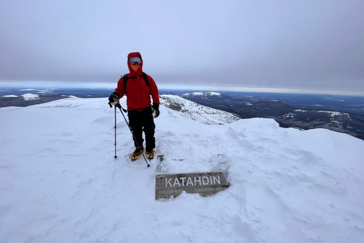 a man is cross country skiing in the snow