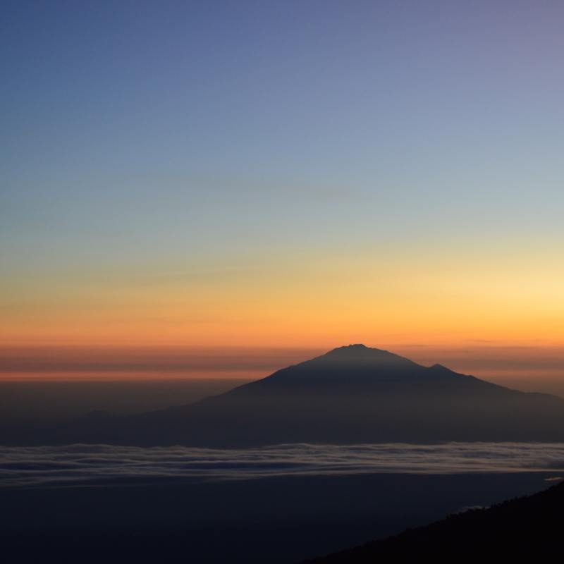 a sunset over a body of water